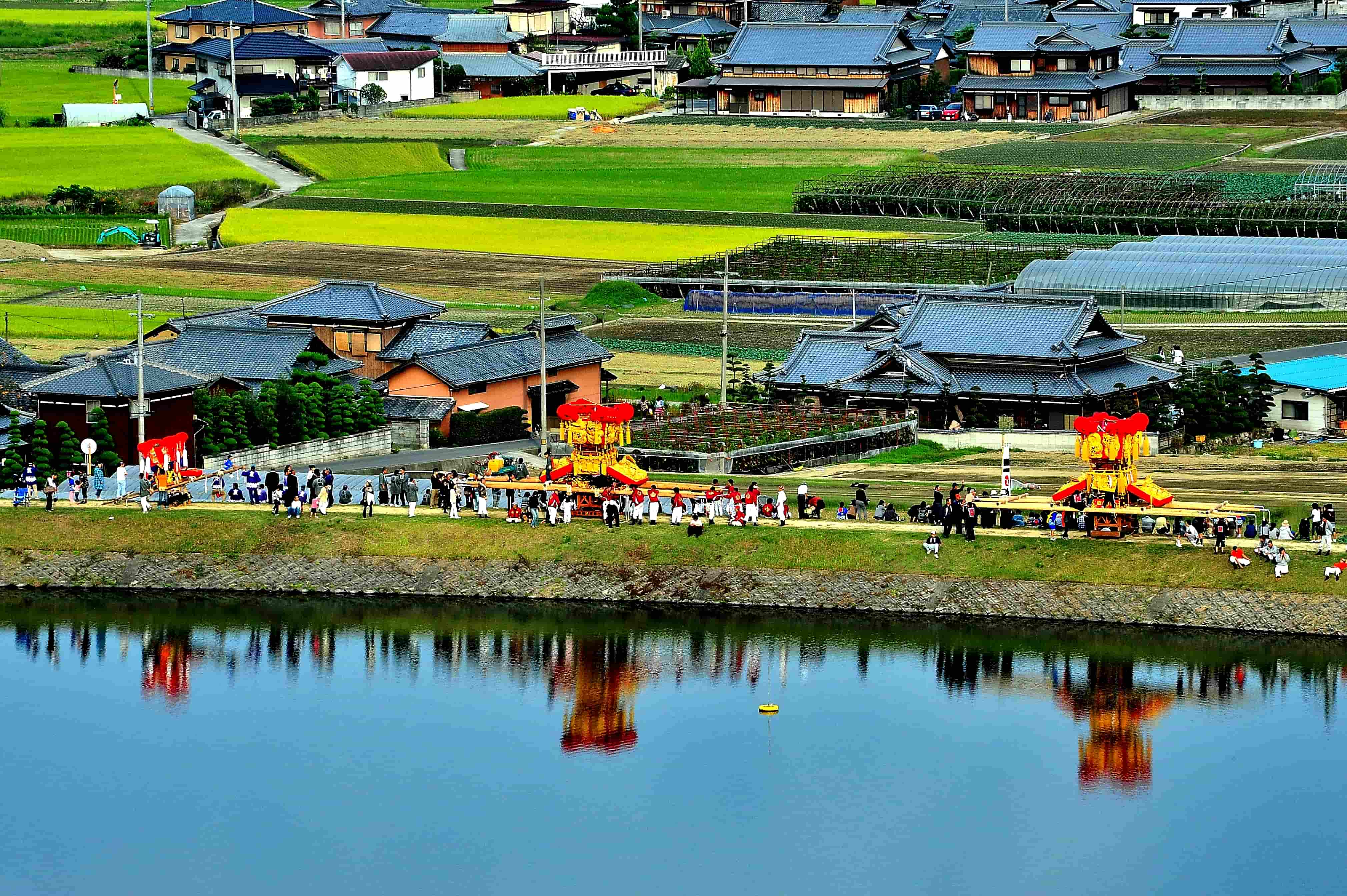 石角　尚義（三豊市）「秋祭りの池畔」